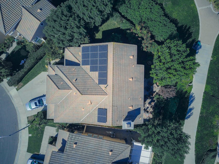 Professional gutter unclogging Dadeville Professional gutter unclogging Dadeville
- Top-down aerial view of a house with solar panels, showcasing modern renewable energy solutions.